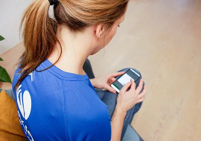 Massør med partner app åben